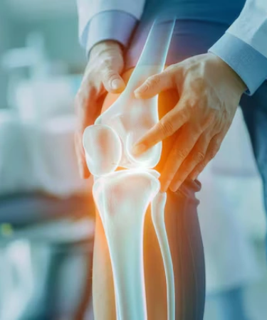 Orthopaedic doctor examining a patient's knee joint